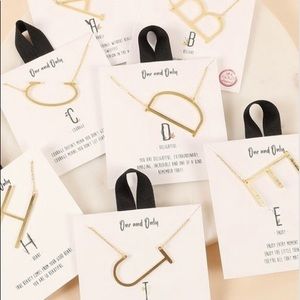 Initial charm necklaces